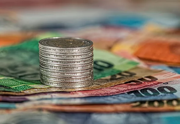 how can the government reduce the wealth gap in a mixed market economy